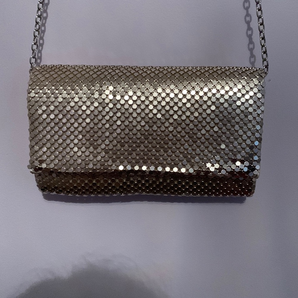 Could be a cross body or as a clutch